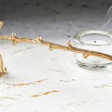 Bird on twig candle snuffer